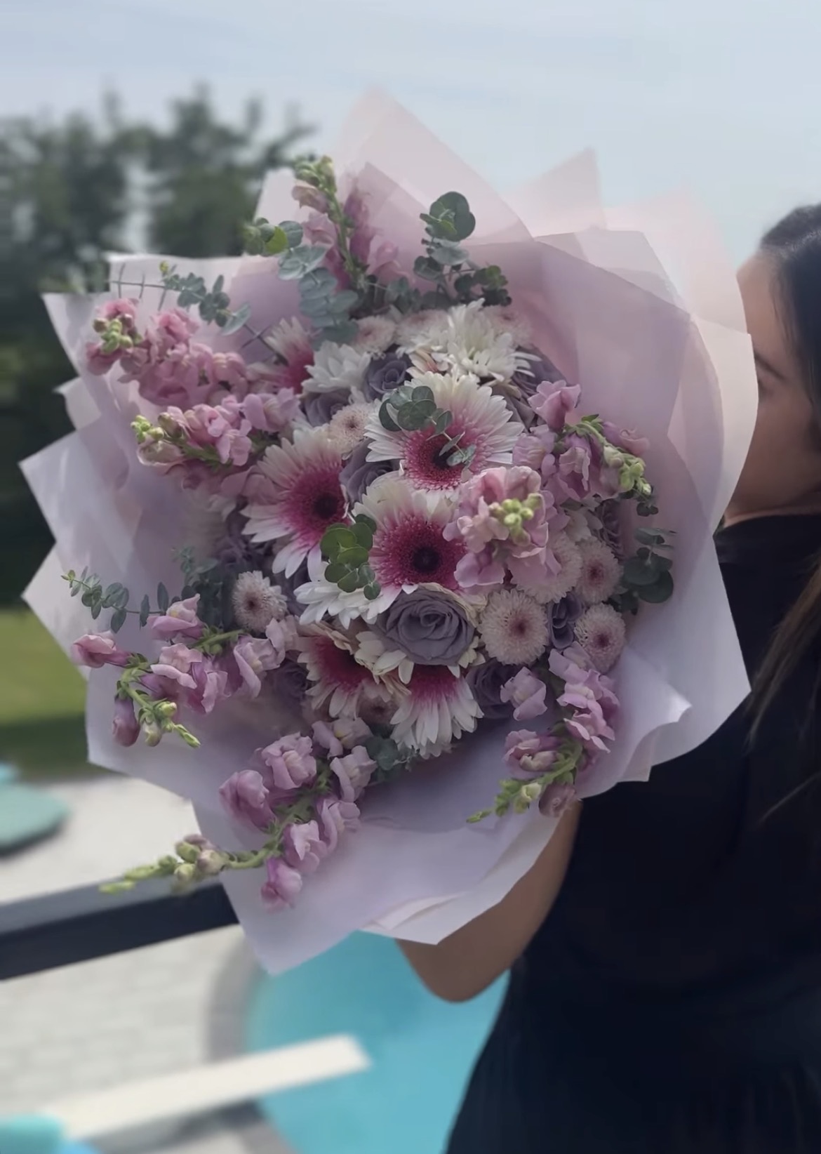 Hand-tied bouquet of mauve roses, gerberas and snapdragons by Velin